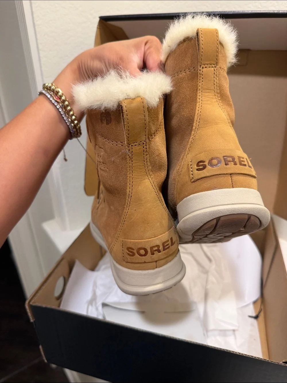 Sorel cozy faux